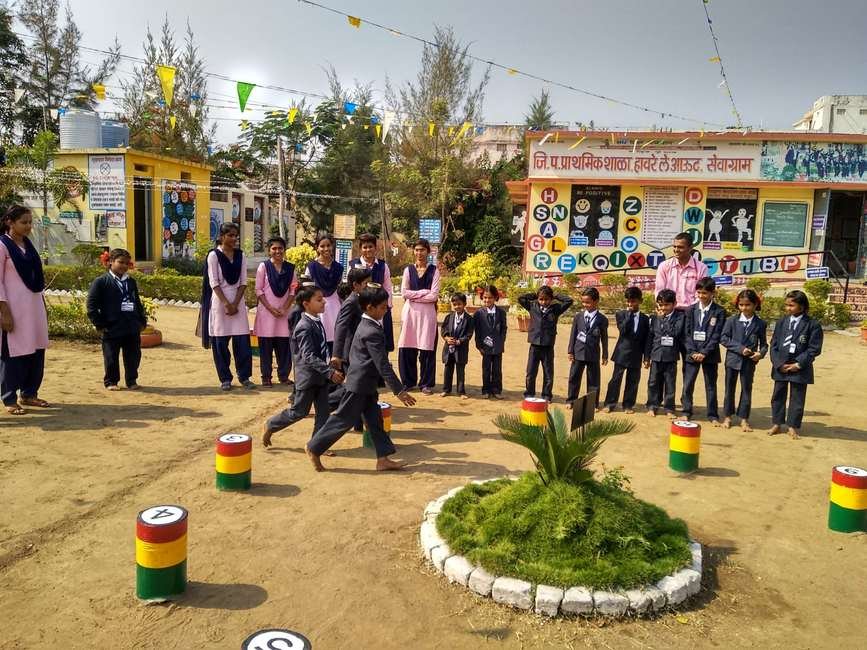 Students facilitating games at a school field placement